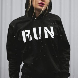 Black hoodie with the word “RUN” printed in white on the chest.