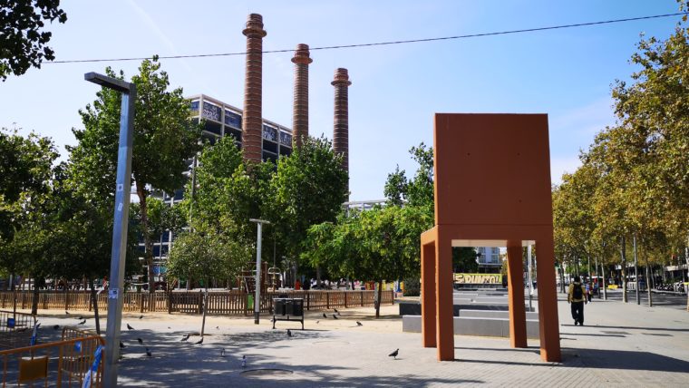 Image of three old industry chimneys.